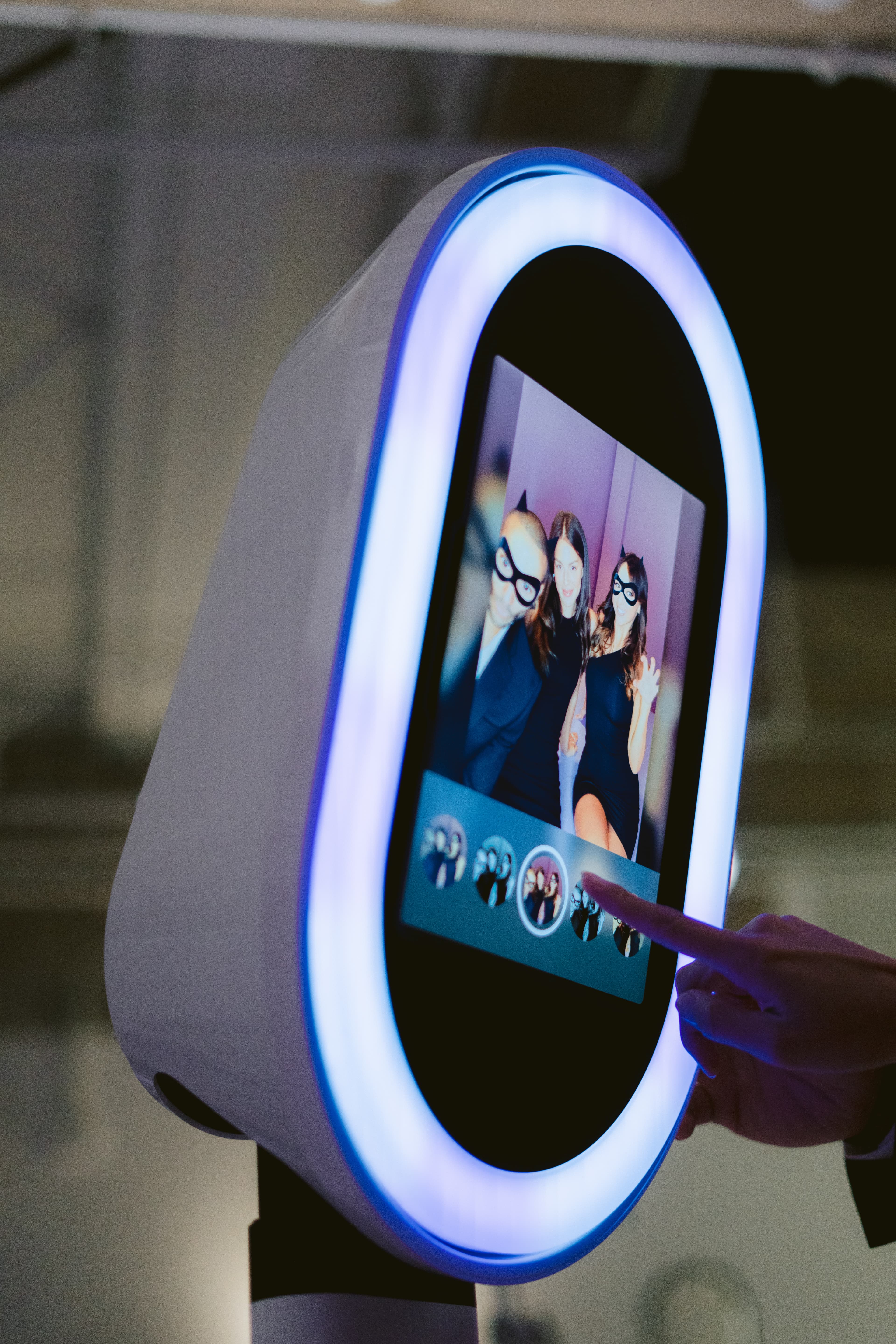 Guest selecting a photo on the Luxpiq touchscreen